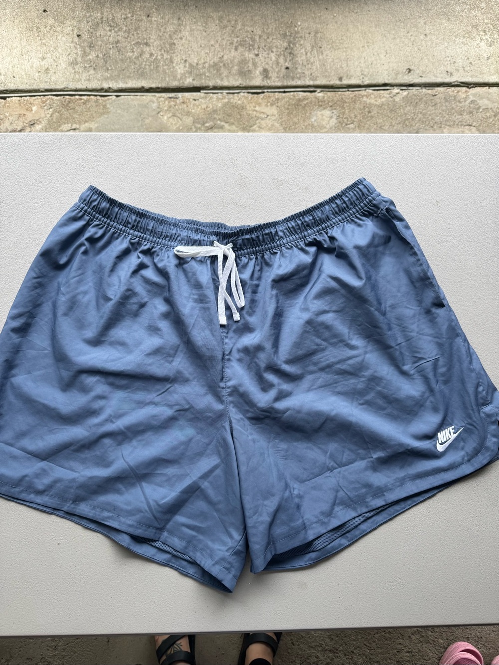 Nike Men's Blue Athletic Shorts with White Drawstring